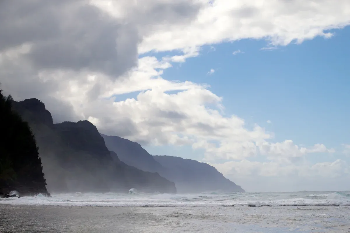 Kee Beach at the end of the road with Na Pali Coast cliffs on Kauai